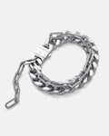 13mm Thick cuban link bracelet with thin paperclip chain attached. Doubele chain bracelet in silver on grey background.