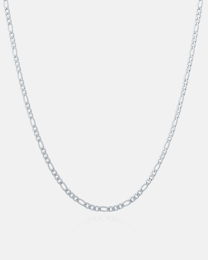 The 2.9mm Figaro Chain is a simple, thin stainless steel necklace featuring small, uniform links. It's non-tarnish, durable, and shown against a plain white background.