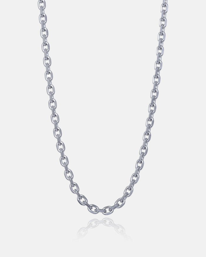 The 4.5mm Cable Chain, a stainless steel necklace with oval links and diamond-cut edges, is displayed on a plain white background. The beveled chain is centered, forming a gentle curve at the bottom.