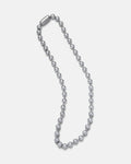 The 7mm Ball Chain is a stainless steel necklace with evenly spaced round beads and a cylindrical clasp, shown in an oval on a white background—ideal for vintage punk style or as a 90s mall goth accessory.