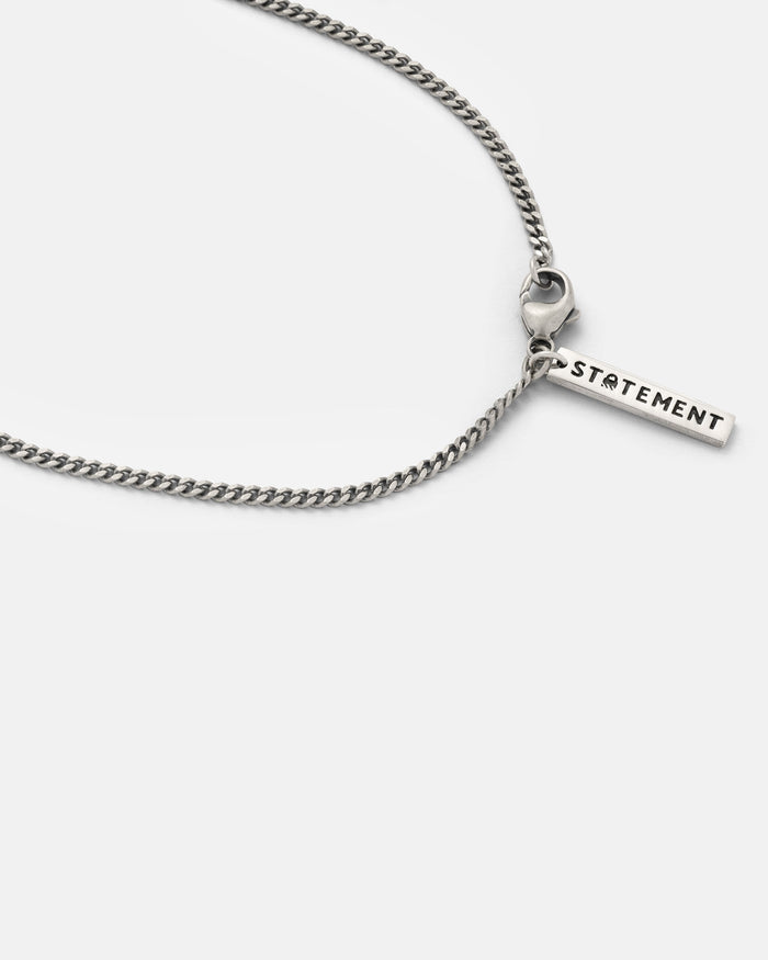2mm curb chain in 925 sterling silver by statement collective close up with tag