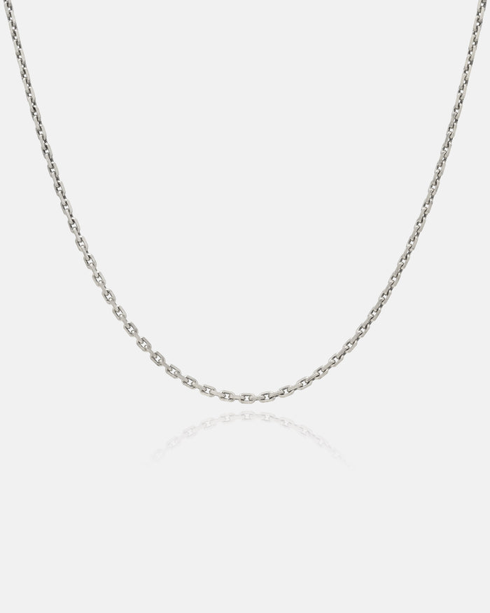 Sterling silver 3mm cable chain on grey background