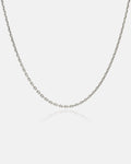 Sterling silver 3mm cable chain on grey background