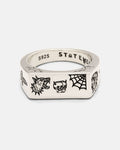 Introducing the Statement Collective 925 Sterling Silver Tattoo Signet Ring—a silver square signet ring engraved with black patchwork tattoo designs, featuring a wolf head, skull, spider web, and other small symbols. Crafted from 925 sterling silver, the inner band is stamped with “S925” and “STATEMENT.”.