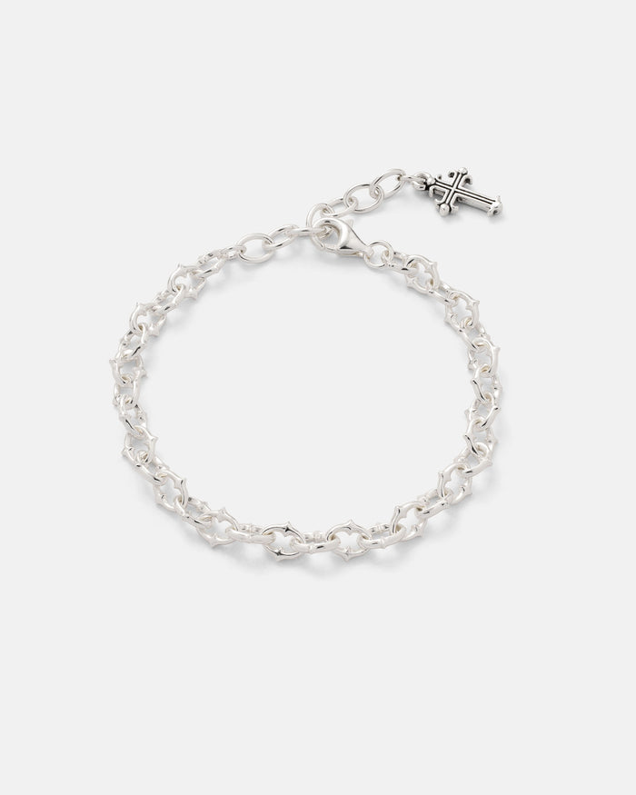 Introducing the Statement Collective 925 Sterling Silver "The Cathedral" 6mm Spiked Bracelet, featuring bold interlocking links and striking spiked detailing, elegantly displayed on a plain white background.