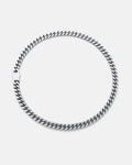 The 9mm Cuban Chain, in silver with a flat clasp, is displayed in a circular shape on a plain light gray background.