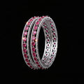 Pair of pink gemstone hoop earrings on a black background with 'SAHELI' brand logo.