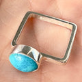 Wildflower Artisans BALAAM square sterling silver band ring featuring an oval sky blue turquoise cabochon stone.