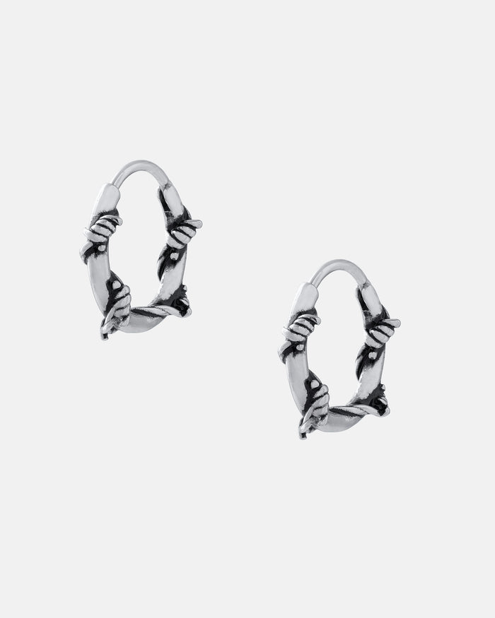 Barbed Wire Hoop Earrings made of hypoallergenic stainless steel, shown on a plain light gray background.