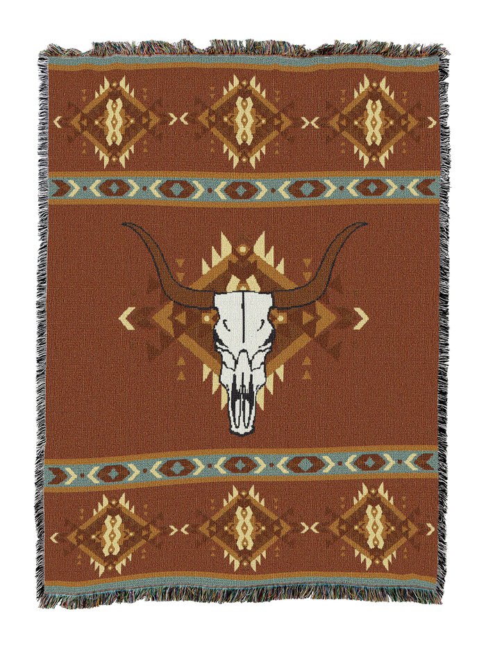 Rust cotton throw blanket with a single large longhorn steer skull centered over a spray of feathers, framed by teal and cream geometric bands at the top and bottom
