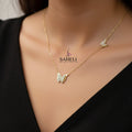 Gold butterfly necklace on a branded card with 'A.B.N' and 'Saheli' branding.