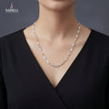 Silver chain necklace on a black mannequin with 'SAHELI' branding.