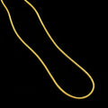 Gold chain on a gray background with 'Saheli' branding.