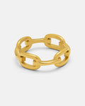 The Chained Ring (Gold) by Statement Collective features interlocking links and is plated in 18K gold for a luxurious shine, shown against a plain white background.