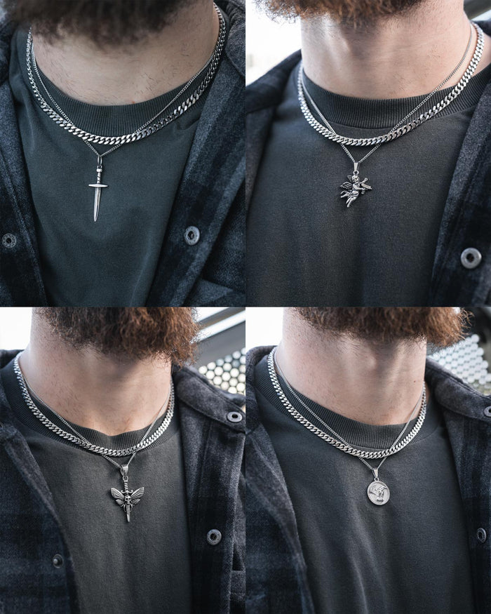 Four images show a bearded man in dark attire wearing the Statement Collective Cuban Set (Custom Pendant Choice)—layered stainless steel chains, including a Cuban link—with sword, winged creature, bee, or medallion pendant options.
