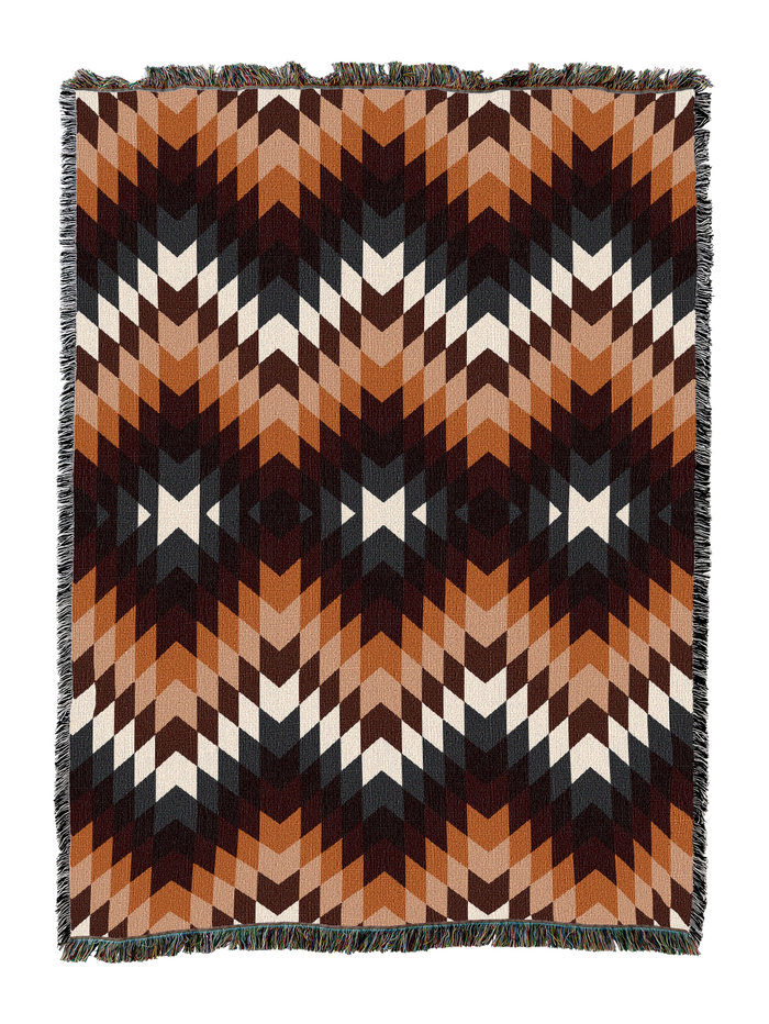 Desert Rose cotton throw blanket in an allover flame stitch zigzag of copper, rust, cream and near black brown