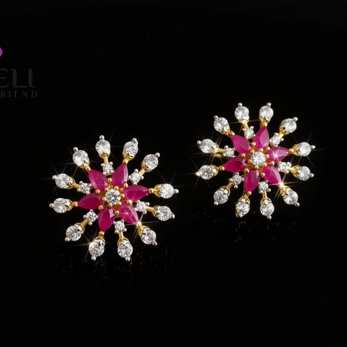Pair of pink and crystal earrings on a gray background with 'SAHELL' branding.