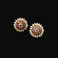 Jewelry earrings with red and white stones on a black background, featuring the brand 'Saheli'.