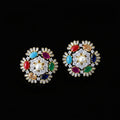 Pair of colorful gemstone earrings on a dark background