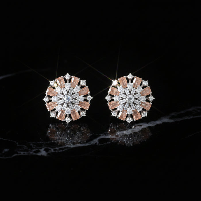 Pair of diamond earrings on a dark background