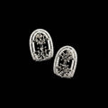 Pair of silver earrings with gemstones on a gray background, featuring the Saheli brand.