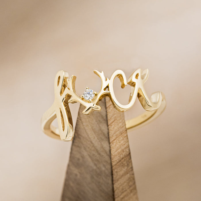 "EFFIE" - SCRIPT STYLE BREAST CANCER AWARENESS RING WITH A SINGLE DIAMOND ACCENT-1