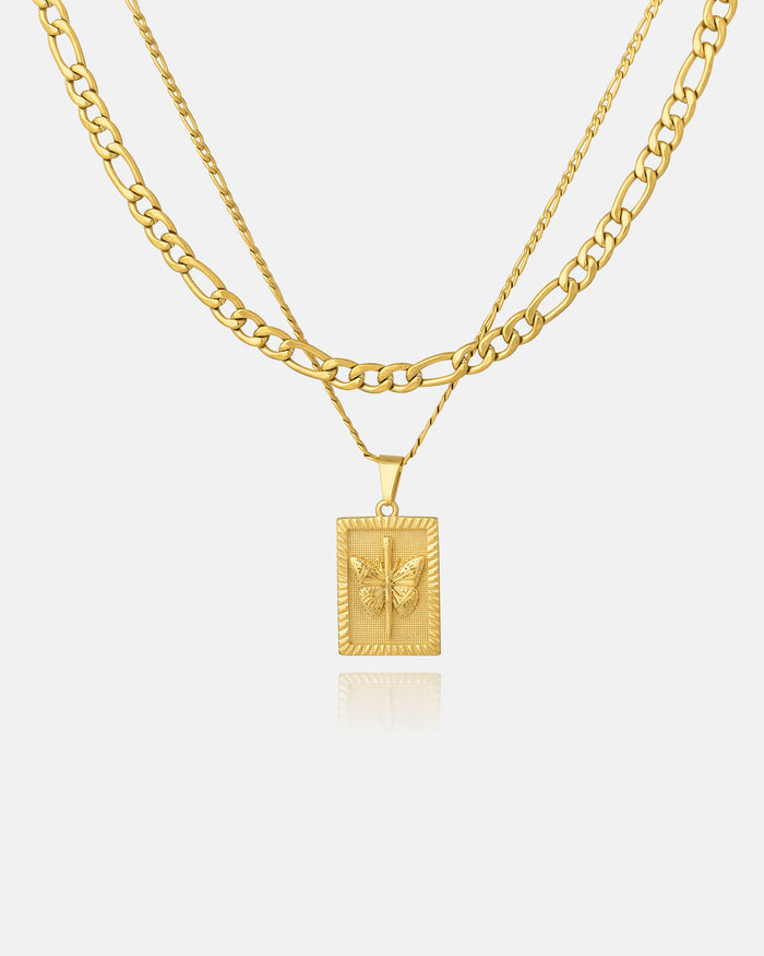 The Figaro Set (Custom Pendant Choice) (Gold) features a thin chain, a medium gold Figaro chain, and an 18k gold pendant necklace with a rectangular bee charm, all displayed on a white background.