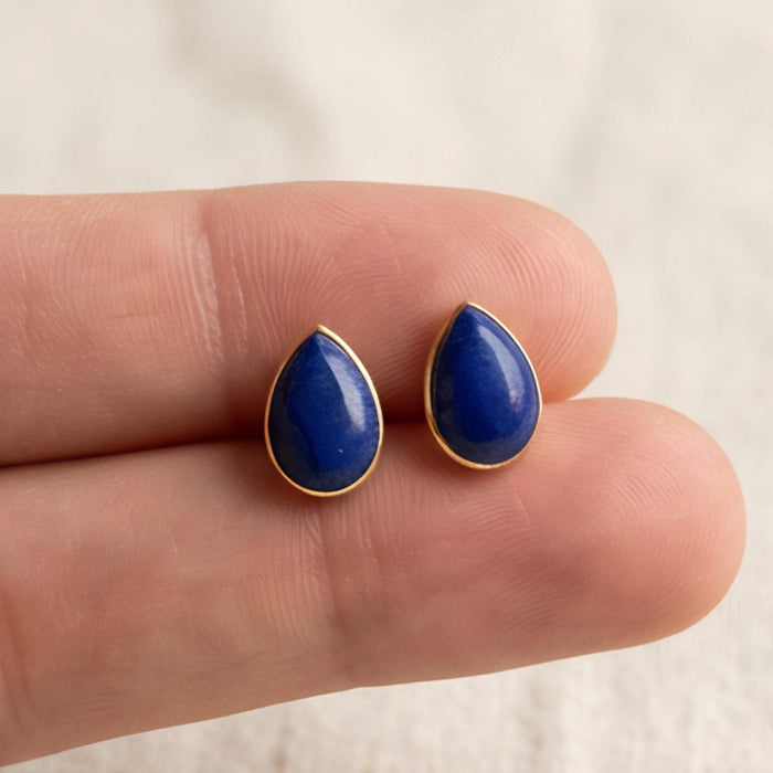 Lapis Lazuli Teardrop Stud Earrings, solid 14K Gold Bezel, on model