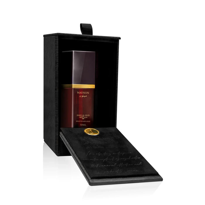 Maynon Jamr Al Oud perfume bottle in a luxurious black gift box from Jamr Al Oud Perfume House