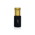 Elegant black and gold Jamr Al Oud perfume bottle with Arabic text, luxury fragrance