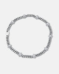 The "Morning Star" Cuban Chain necklace in silver features white flower-shaped accents and is displayed against a plain light gray background.