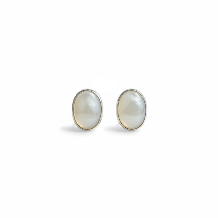 Wildflower Artisans oval opal stud earrings set in polished .925 sterling silver bezels.