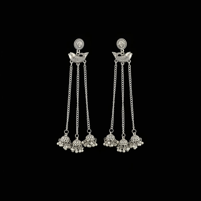 Silver earrings with chain and bead details on a gray background, branded 'SAHELI'.
