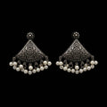 A pair of traditional Indian silver-toned filigree dangle earrings with white pearl bead drops, displayed on a light gray background with the brand logo 'SAHELL MY BEST FRIEND' above them.