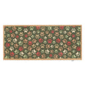 Paws for Love Washable Runner in Green- a 100% recycled cotton runner featuring multi-coloured paw prints in a multi-directional pattern.