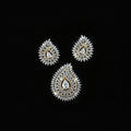 Diamond earrings on a dark background with 'Saheli' branding.