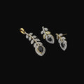 Gold and silver earrings on a dark background with 'Saheli' branding.