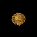 A gold filigree ring with a circular mandala-like floral design, displayed on a black hand against a dark gray background. The brand logo 'SAHELI JEWELLERY' is visible in the top left corner.