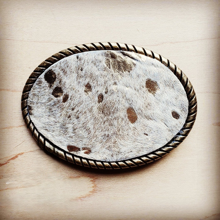 Rope edge belt buckle in white spotted hair on hide, additional view