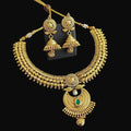 Gold necklace and earrings on a black background with 'SAHELI' branding.