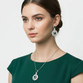 Jewelry set with pendants and earrings on a black background