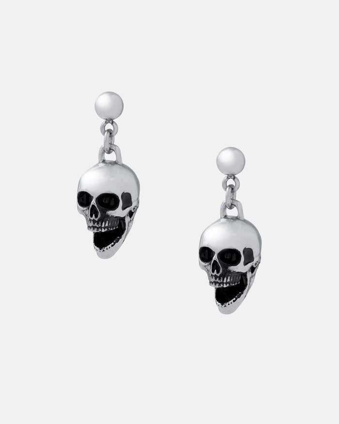 Skull Earrings: Silver dangle earrings with detailed skull charms and black accents, made from hypoallergenic stainless steel—ideal for adding a bold edge to your rock fashion look. Shown on a plain white background.