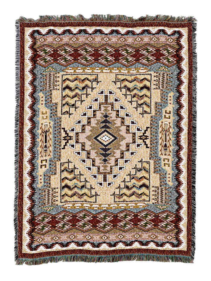 Southwest Butte cotton throw in the Clay colorway, a stepped diamond medallion on a cream field framed by layered zigzag borders in rust, navy and blue grey