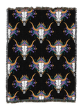 Steer skull cotton throw in the Black colorway, repeating longhorn skulls in white and tan with purple and orange feather accents on a black ground