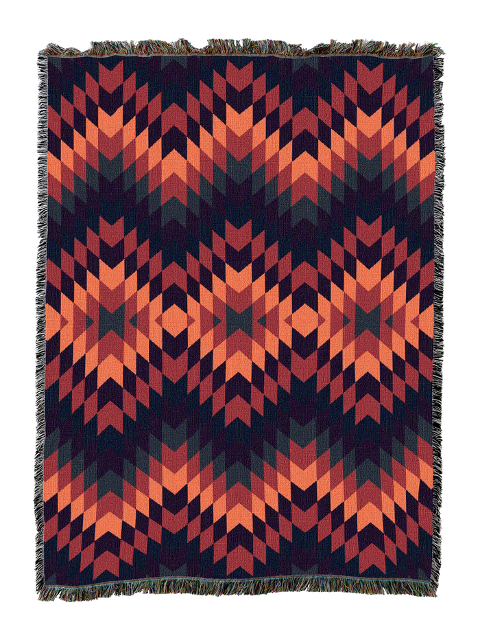 Sunset Desert cotton throw blanket in a high contrast flame stitch zigzag of coral and salmon against deep navy and brick red