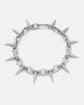 The "Sweating Bullets" Necklace Chain by Statement Collective is a bold men's jewelry piece with pointed spike pendants on a 12mm stainless steel chain, giving an edgy, heavy-duty look, shown against a plain white background.