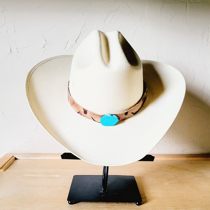 Tan steer embossed leather hat band with a turquoise slab