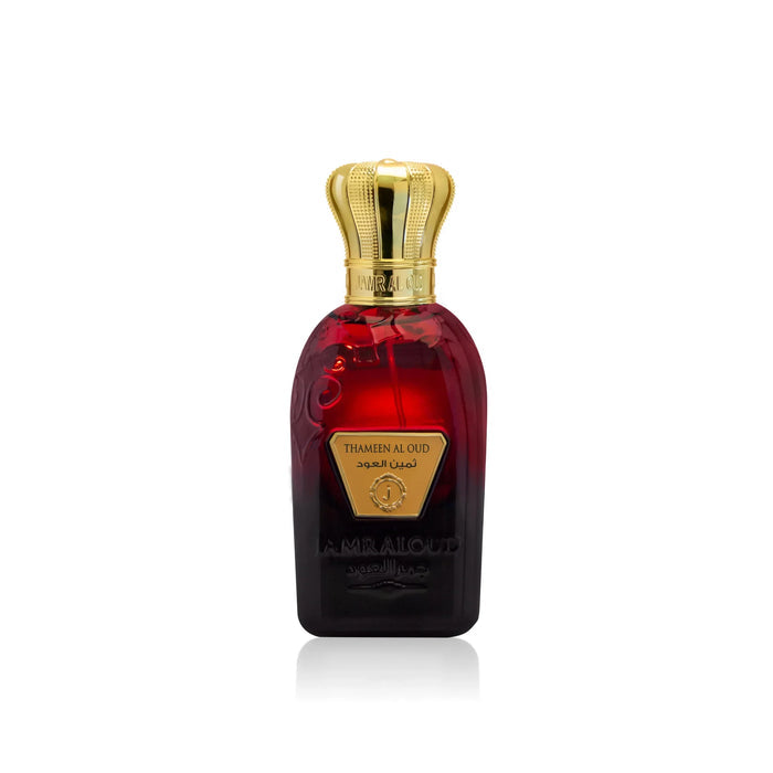 Thameen Al Oud luxury perfume bottle by Jamr Al Oud, red glass with gold crown cap