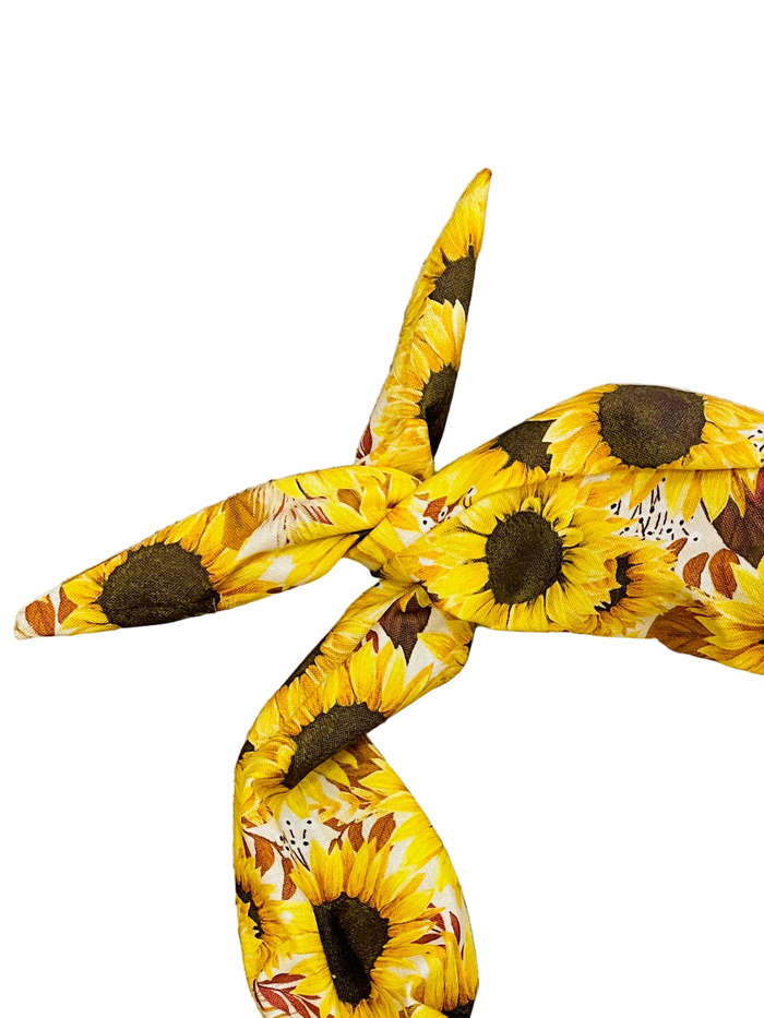 Amanda Bright Designs sunflower harvest headband featuring golden yellow sunflowers with brown centers clusters of brown and yellow leaves