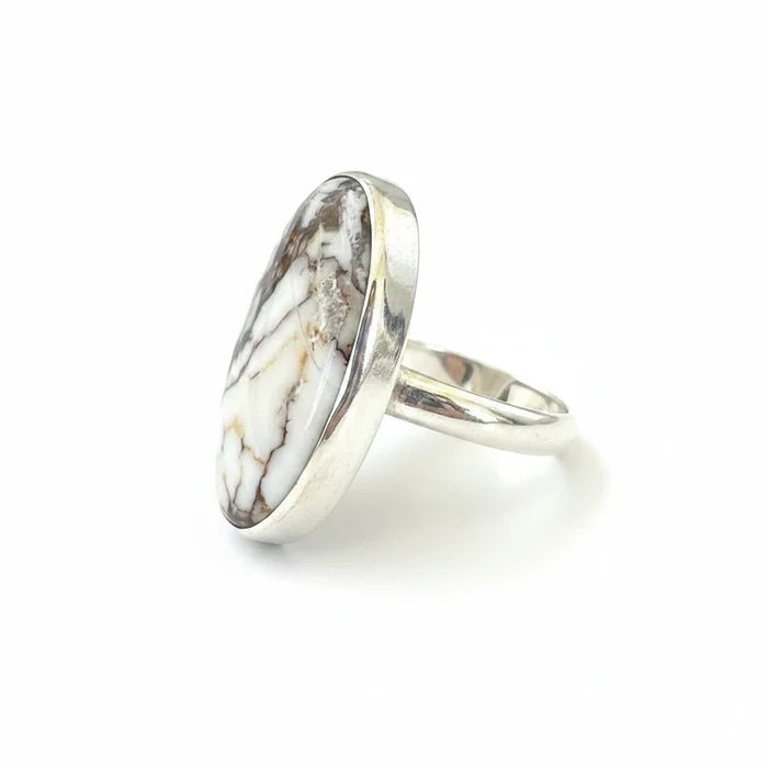 Wildflower Artisans sterling silver ring featuring an oval Wild Horse magnesite cabochon with cream and brown matrix.